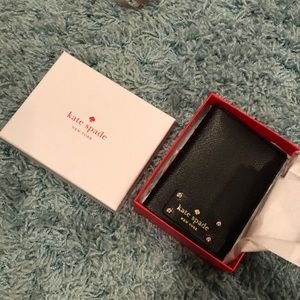 Passport case I believe. Received as a gift.